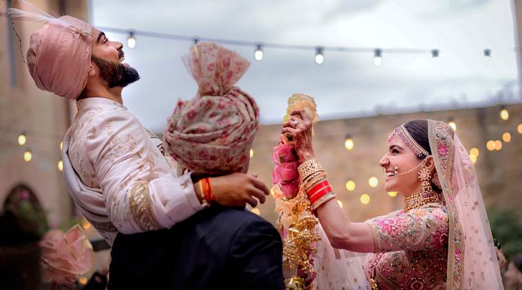 Virat Kohli with Anushka Sharma during their wedding